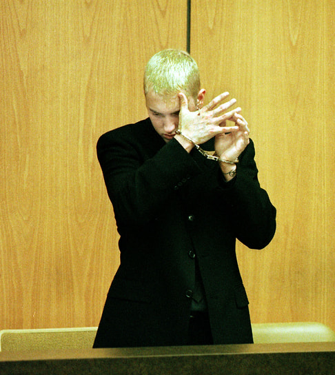 В 2000 году рэпера дважды арестовали с разницей в несколько дней. Его обвинили в насилии и незаконном ношении оружия. Музыкант был приговорен к двум годам лишения свободы условно. Эти события вдохновили Эминем на несколько песен, включая «The Way I Am», «Kim», «Cleaning Out My Closet»