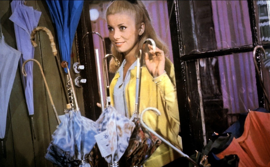 Катрин Денев стала звездой после каннского триумфа музыкального фильма «Шербурские зонтики» (1964, кадр из фильма на фото) режиссера Жака Деми, который впоследствии стал хорошим другом актрисы. Именно он, по словам самой Денев, «разбудил ее». В 1964 году актриса также исполнила главную роль в психологическом триллере Романа Полански «Отвращение» — первом англоязычном фильме режиссера