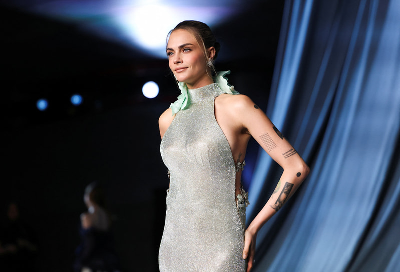 Британская модель и актриса Кара Делевинь
 