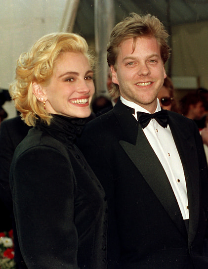 Первым успехом в кино для Джулии Робертс стала роль в фильме «Стальные магнолии» (1989 год), за который она получила «Золотой глобус» и номинацию на «Оскар» в категории «Лучшая актриса второго плана». В это же время у актрисы начались отношения с коллегой Кифером Сазерлендом (на фото), с которым она снималась в фильме «Коматозники» (1990). Однако в 1991 году Джулия Робертс отменила свадьбу с Сазерлендом за несколько дней до торжества