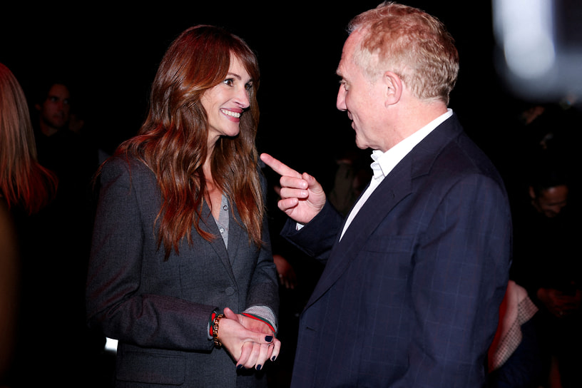 С французским бизнесменом Франсуа-Анри Пино на Неделе моды в Милане, 2023 год