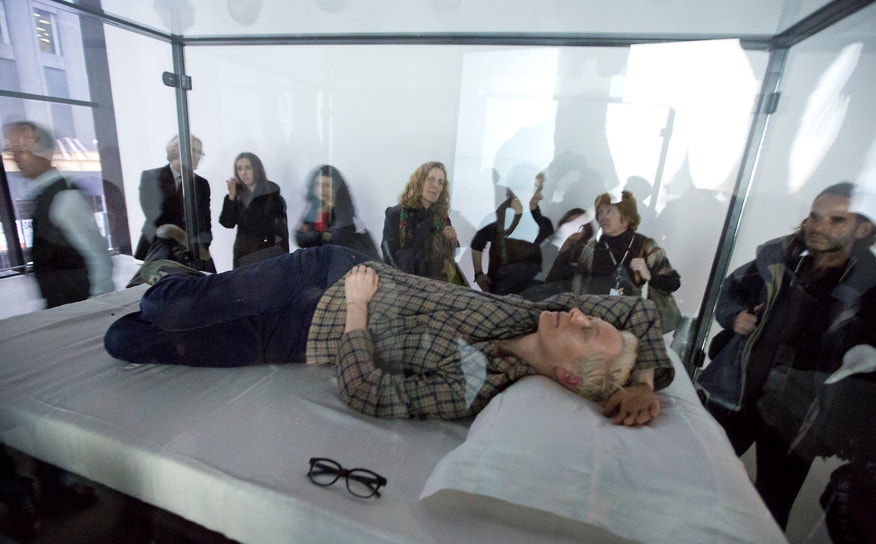 В 2013 году Тильда приняла участие в перформансе The Maybe в Нью-Йоркском музее современного искусства. Актриса спала в стеклянном ящике по восемь часов в день. «Живой актер, стекло, сталь, матрац, подушка, полотняное белье, вода и очки»,— было написано на табличке возле инсталляции с Тильдой